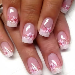 CTTHNBD close-up of floral French tip detail highlighting delicate design and polish