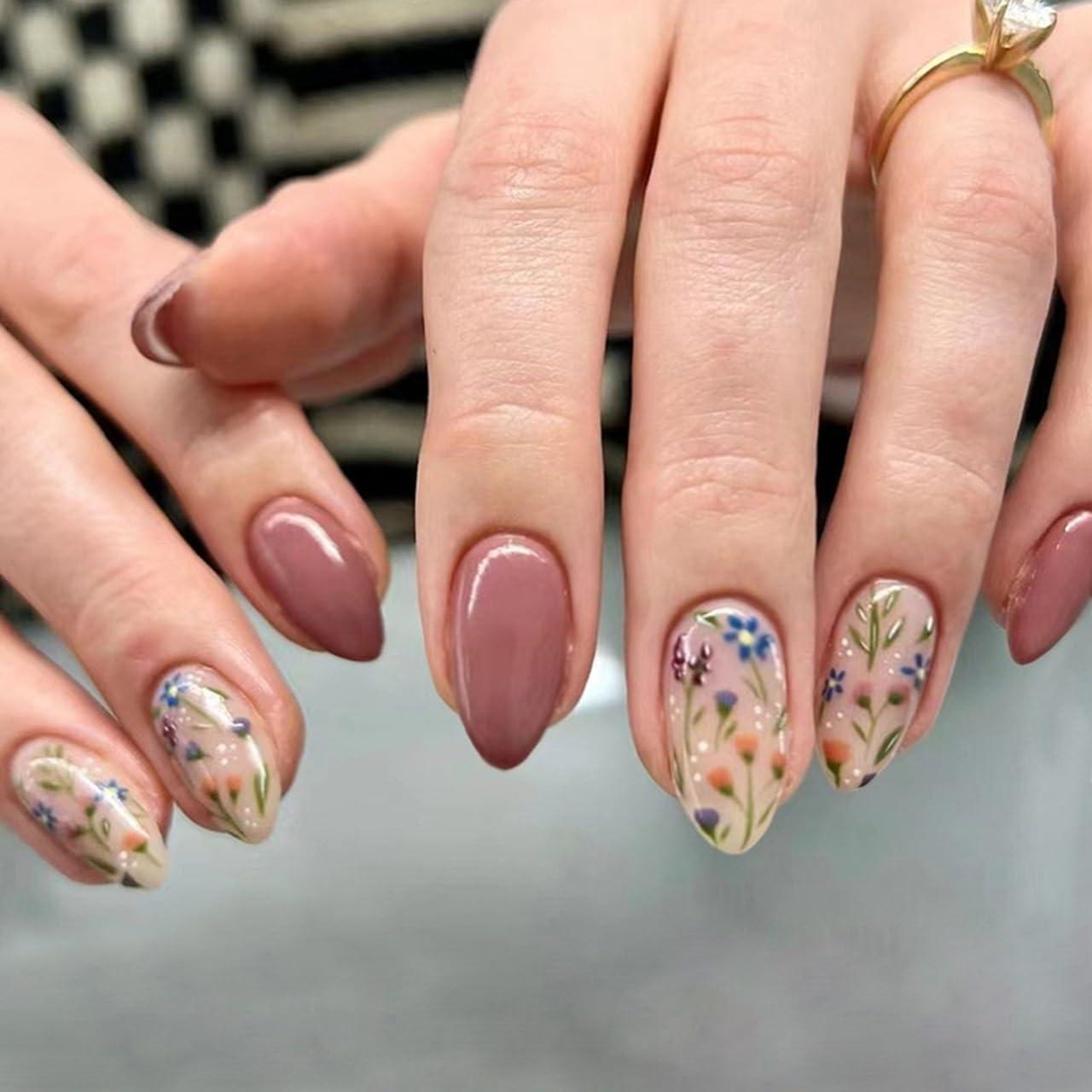 CTTHNBD close-up of floral pattern detail on a nail, showing intricate printed design