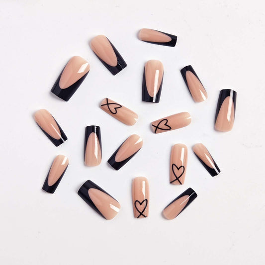 CTTHNBD close-up of heart design detail on glossy black French tip for style