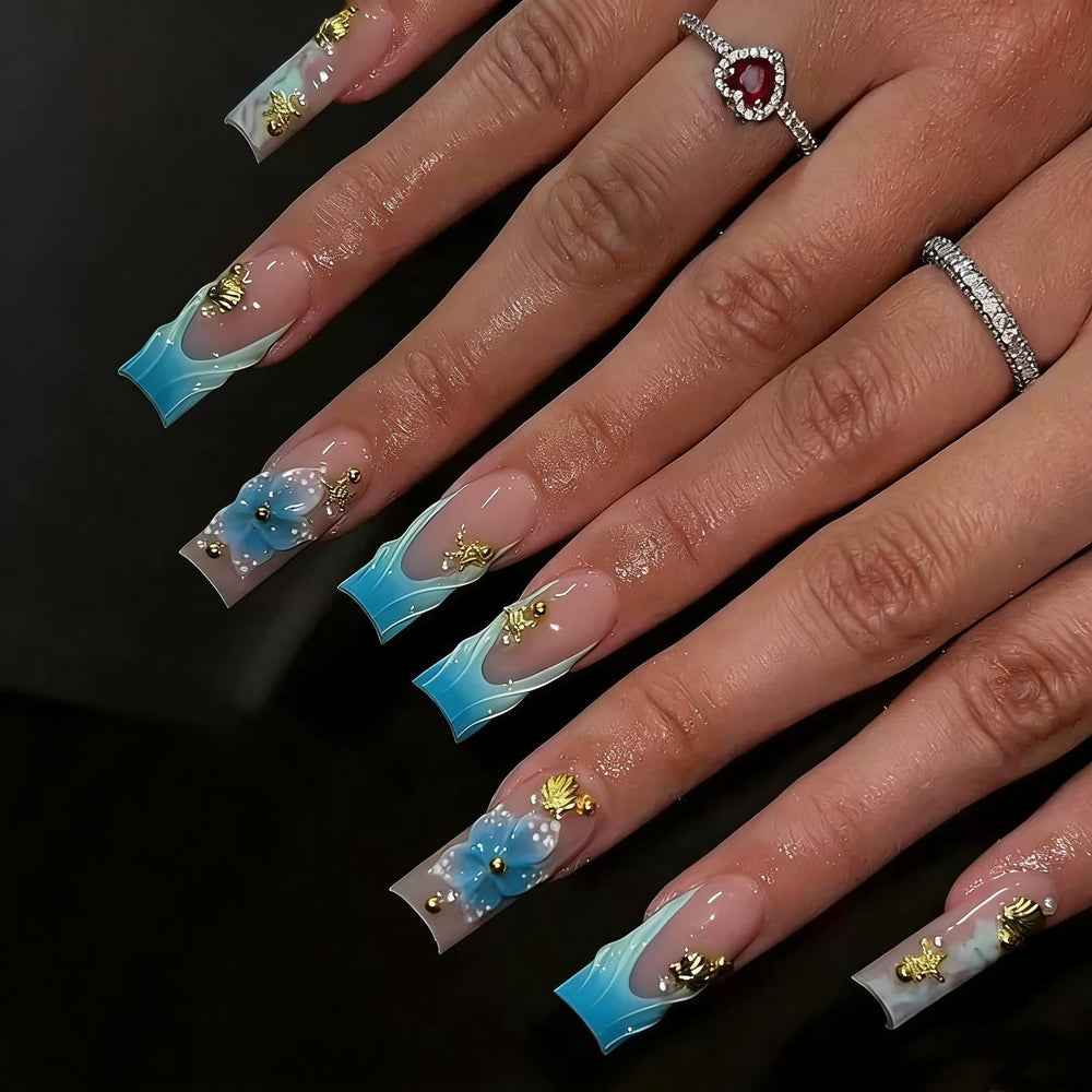 CTTHNBD front packaging showing blue French tip nails and floral design, easy salon look