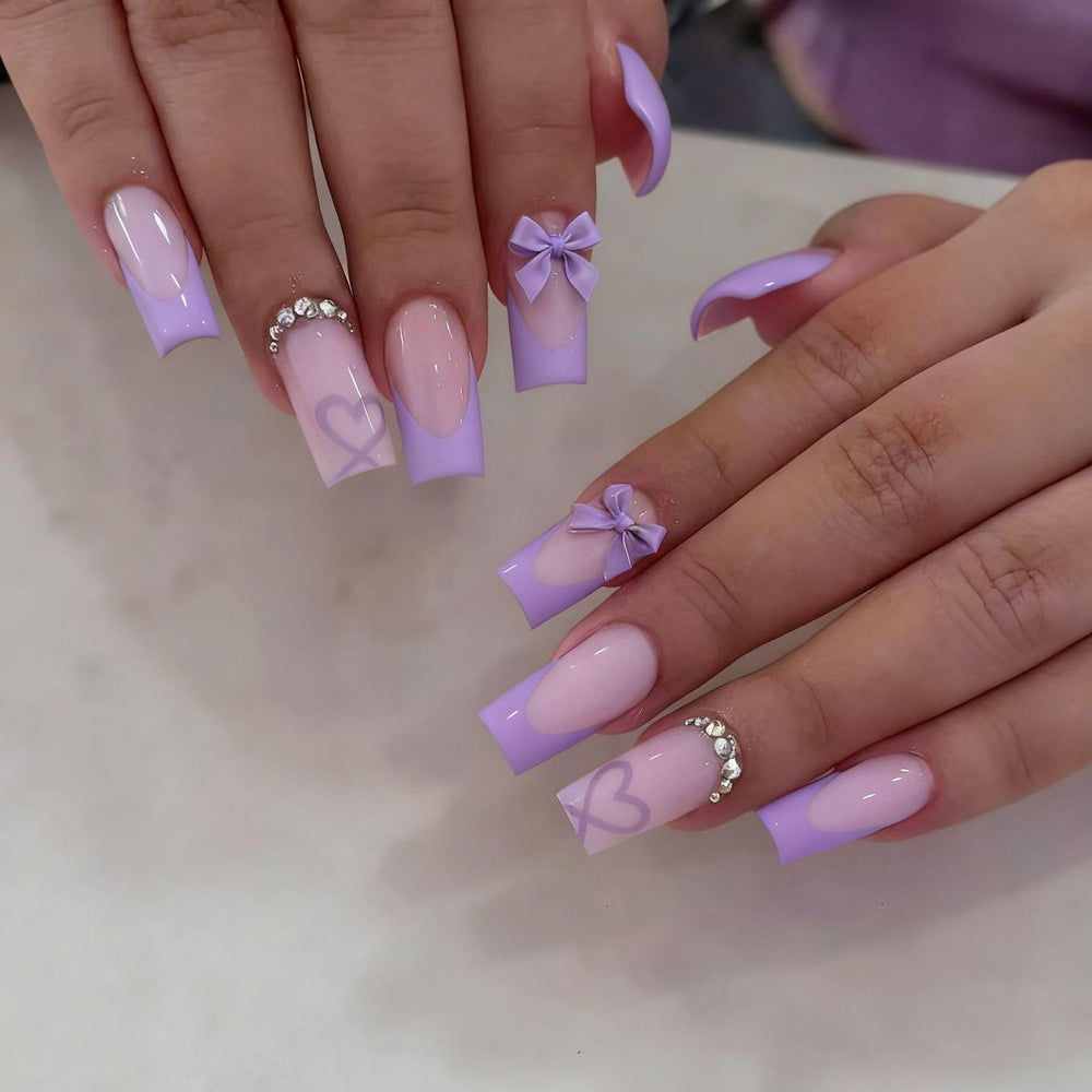 CTTHNBD front view of coffin purple French tip nails showing style and easy application