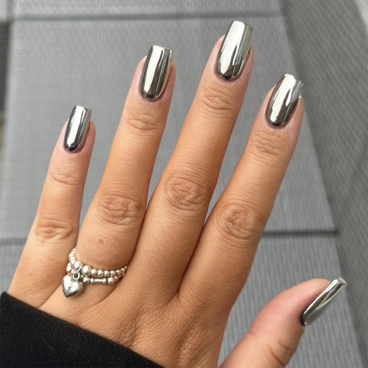 CTTHNBD front packaging showing 24-piece silver press-on nails and tools for easy use