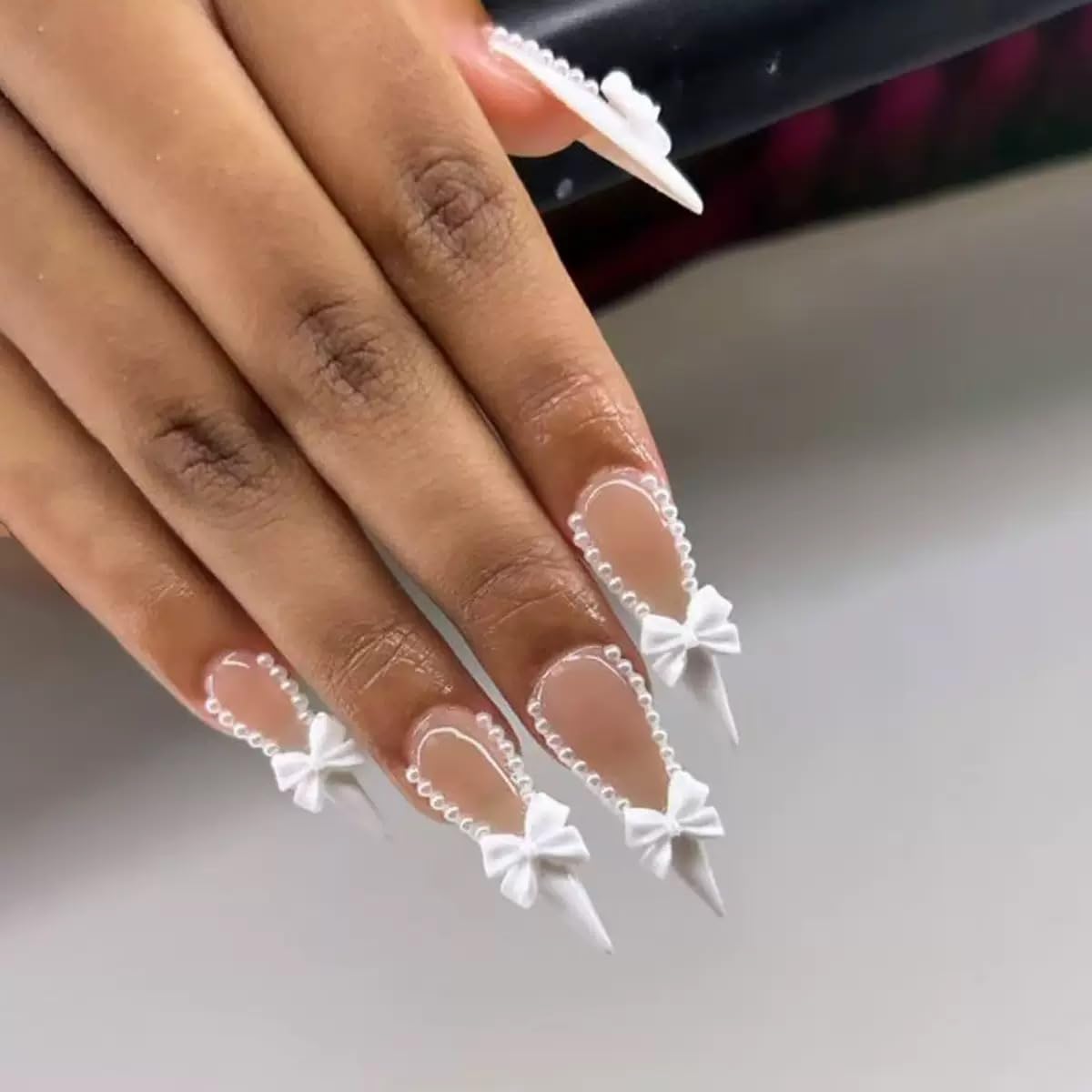 CTTHNBD front packaging showing 24 white French tip nails and included tools for easy styling