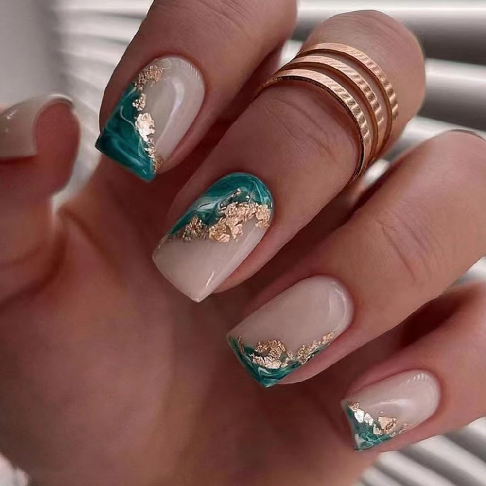 CTTHNBD hand applying a press-on nail illustrating quick at-home application