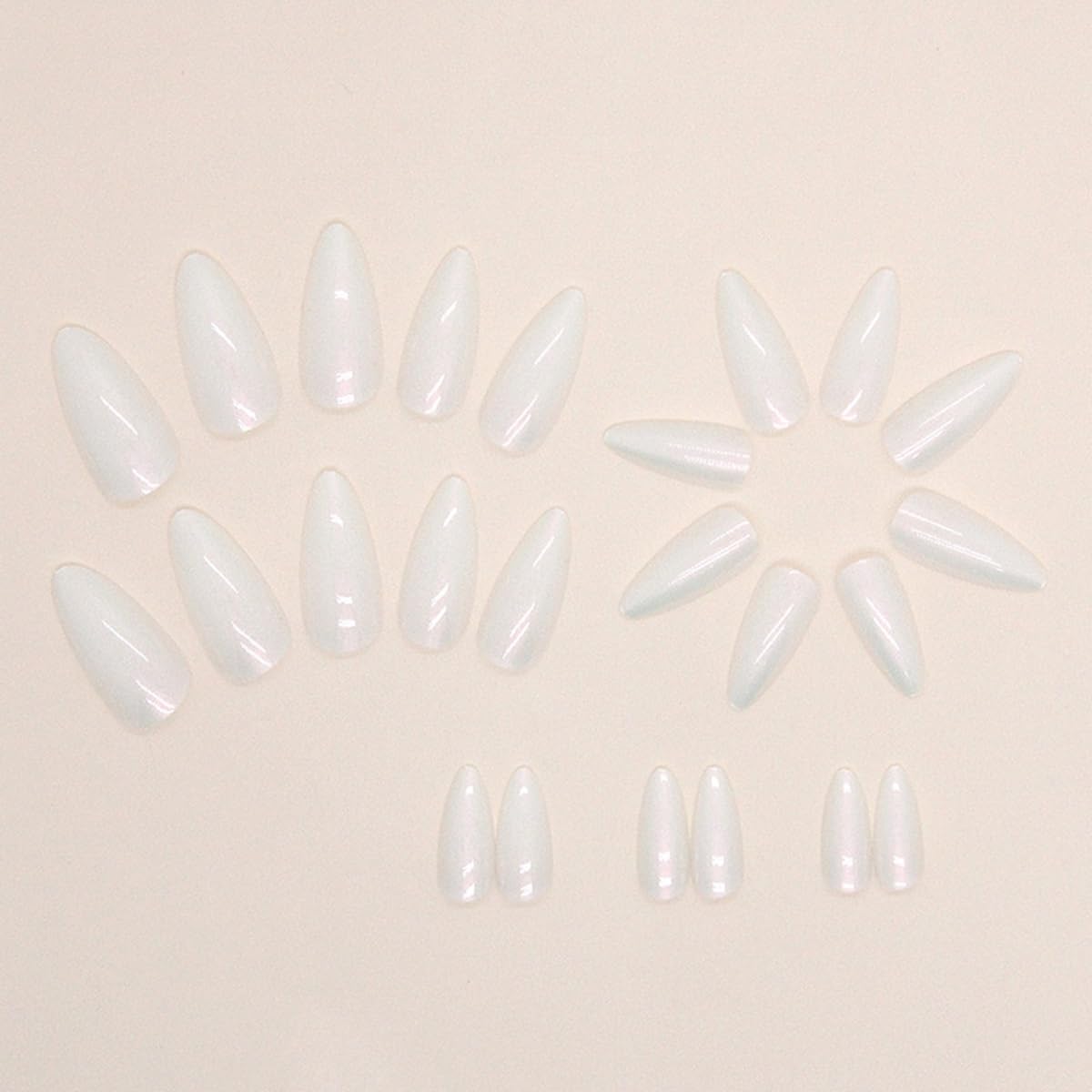 CTTHNBD nails on hand demonstrating wearable medium almond shape