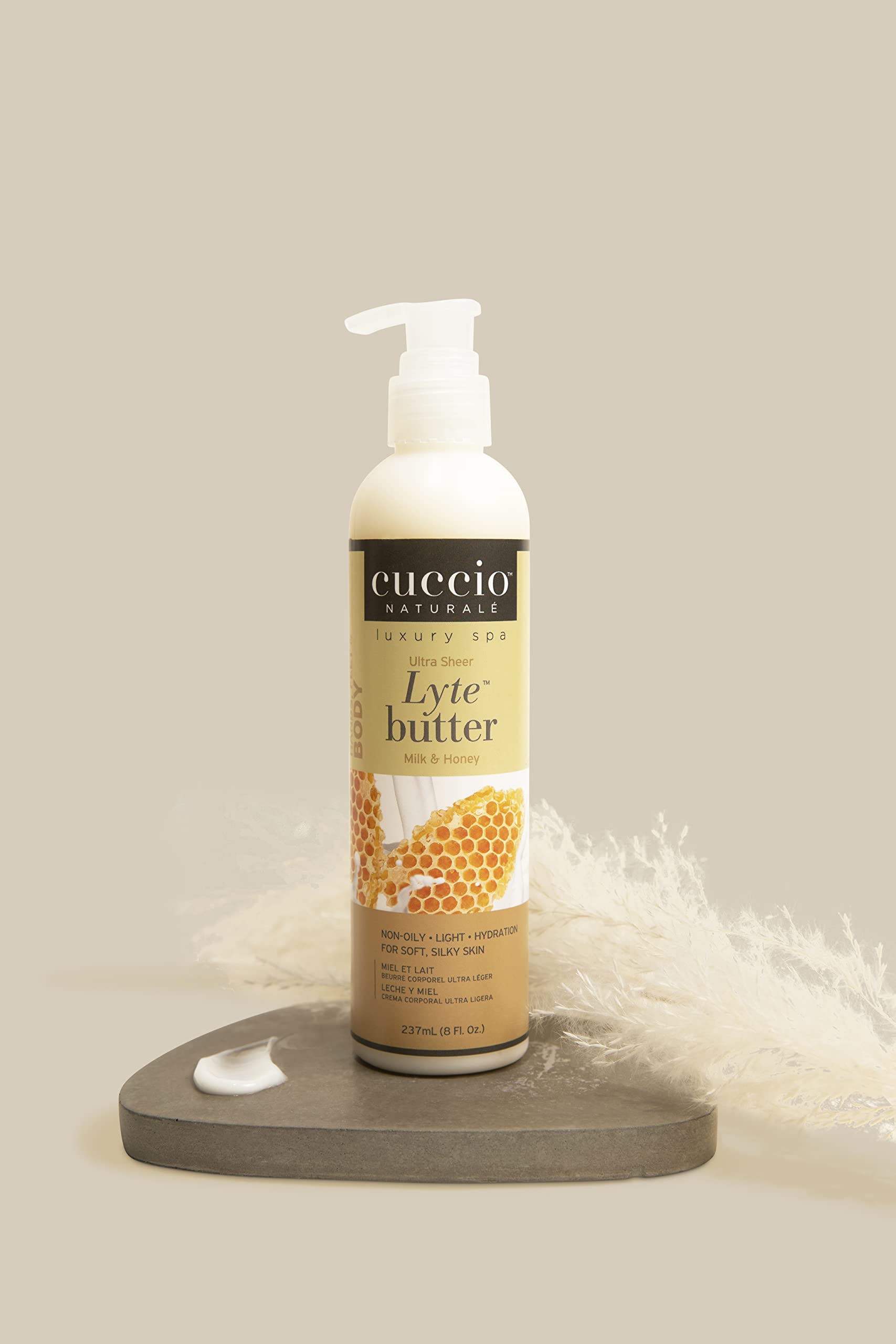 Cuccio body butter in use on forearm providing visible softness and instant hydration