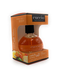 Cuccio open cap with dropper dispensing oil for precise, no-waste application