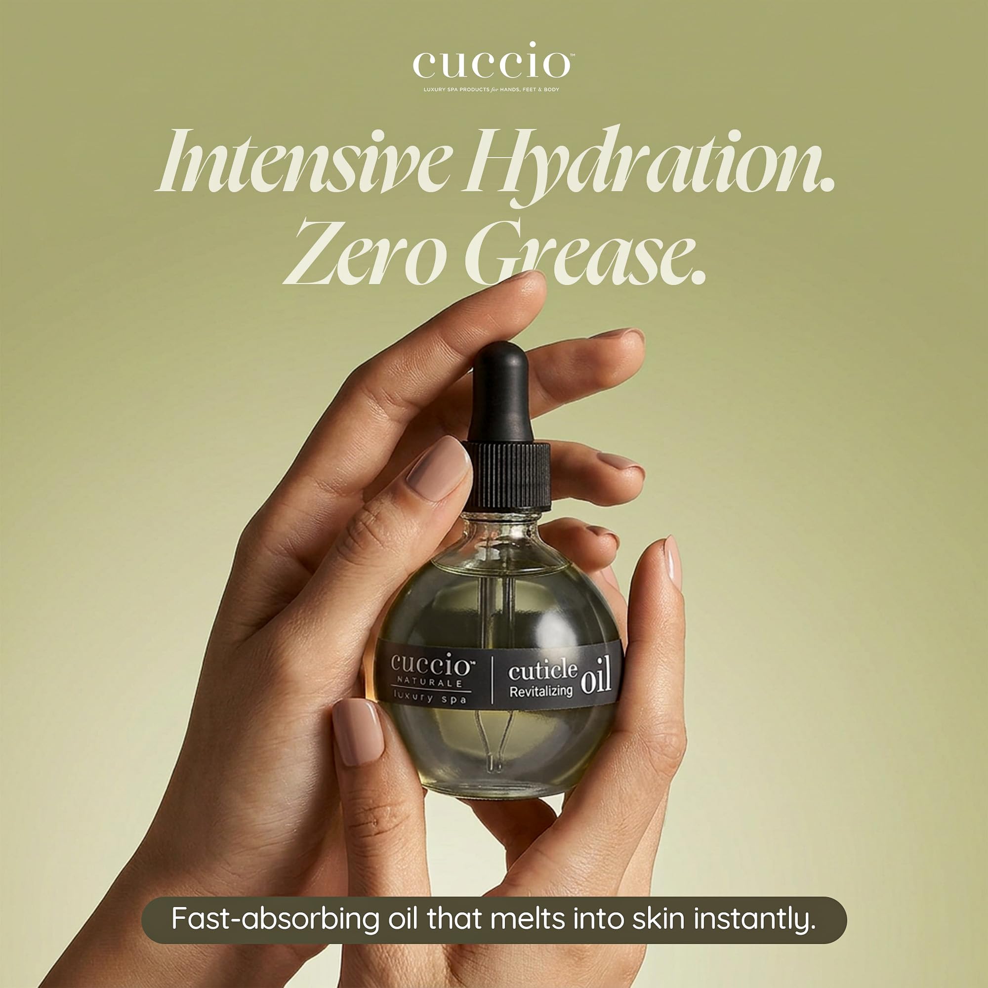 Cuccio bottle held beside fingers showing 2.30 fl oz scale and travel-friendly size