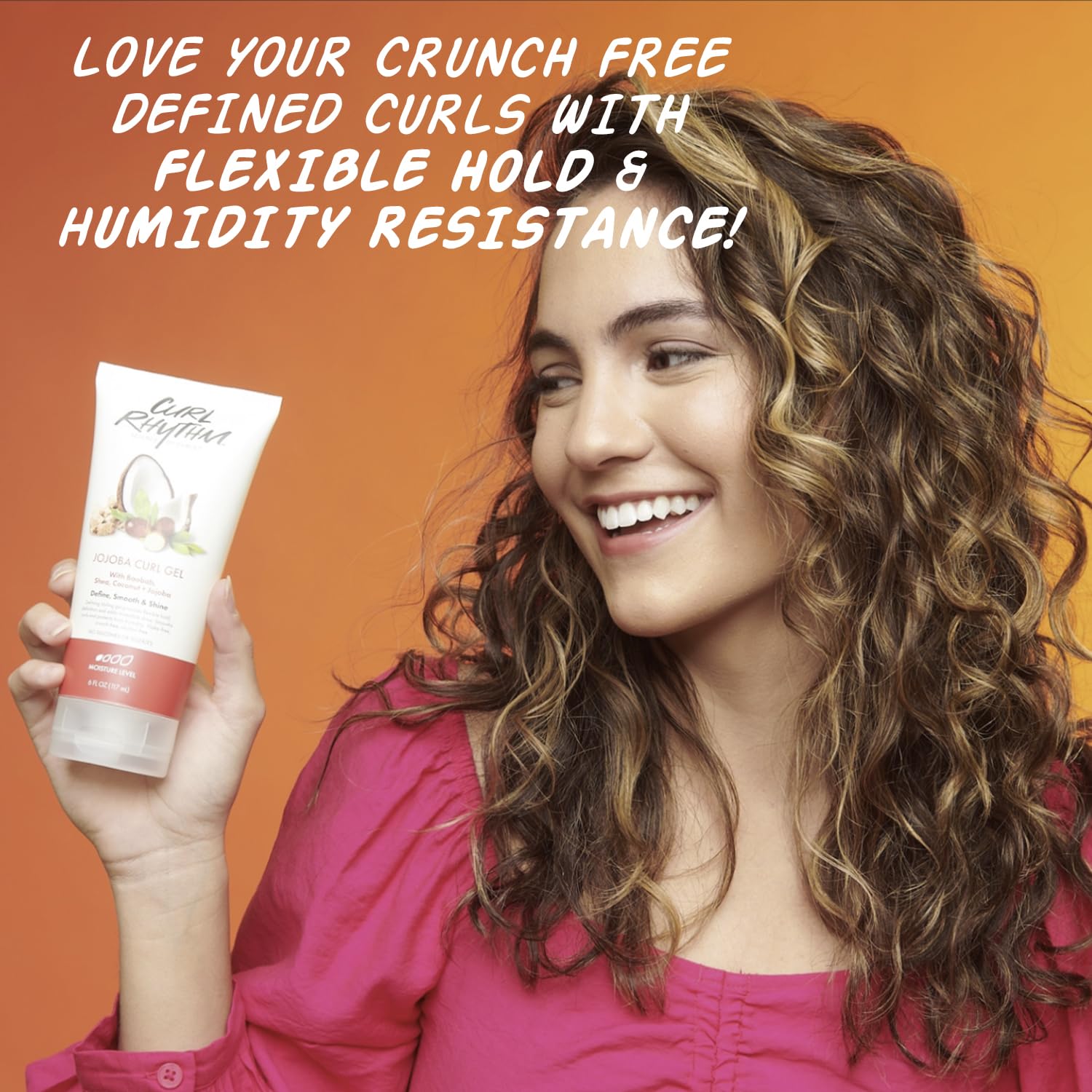 Curl Rhythm gel applied to wet curls in hands for even distribution