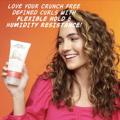 Curl Rhythm gel applied to wet curls in hands for even distribution