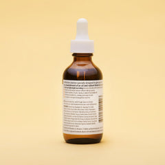 Curl Rhythm bottle on bathroom shelf in lifestyle setting suggesting daily use