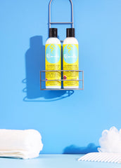 Curls bottle on bathroom shelf styling-ready and visually calming