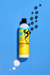Curls Blueberry Bliss texture close-up highlighting creamy formula and slip benefit