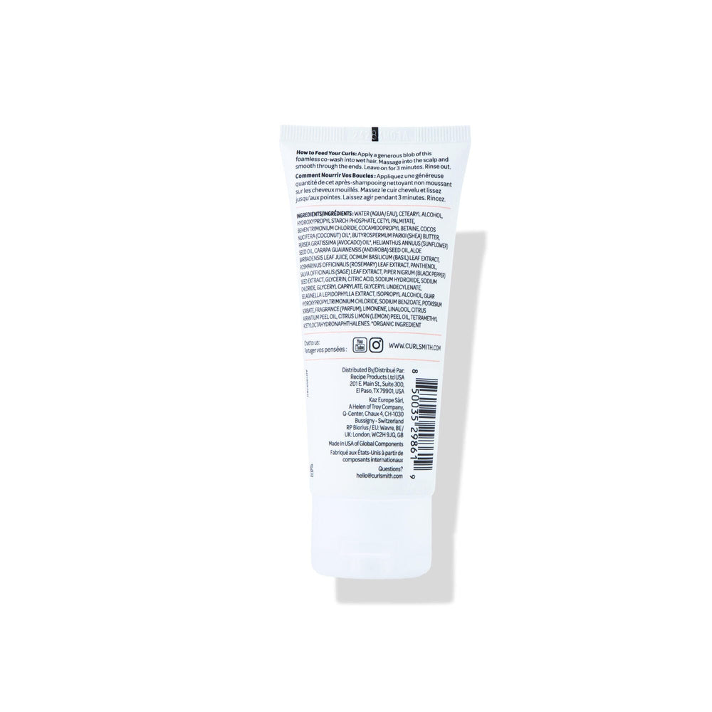 CURLSMITH bottle on bathroom shelf with towel showing shelf-ready presentation
