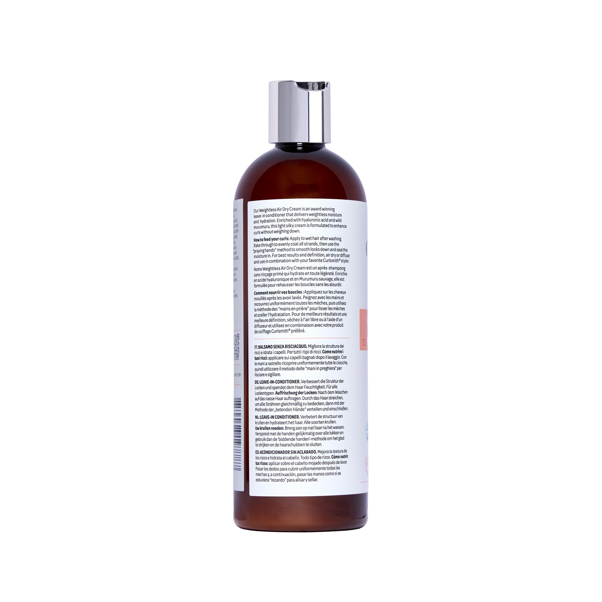 CURLSMITH cream inside travel kit with styling tools, suggests on-the-go styling ease
