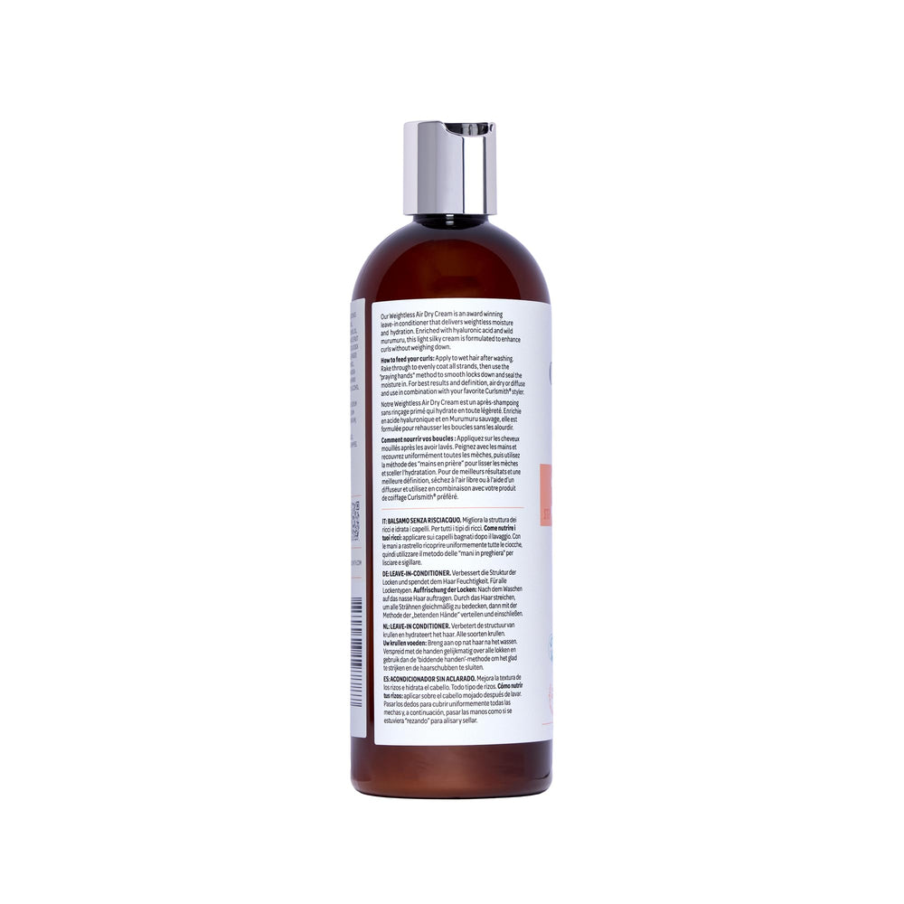 CURLSMITH cream inside travel kit with styling tools, suggests on-the-go styling ease