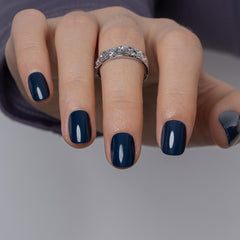 CurvLife nails applied while typing showing low-profile extra short convenience