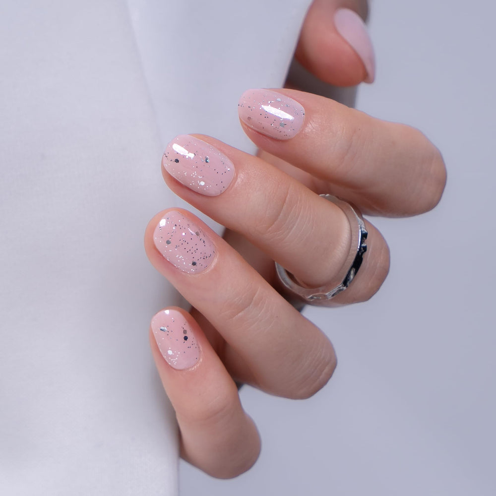 CurvLife applying nail with glue demonstrating secure, long‑lasting adhesion