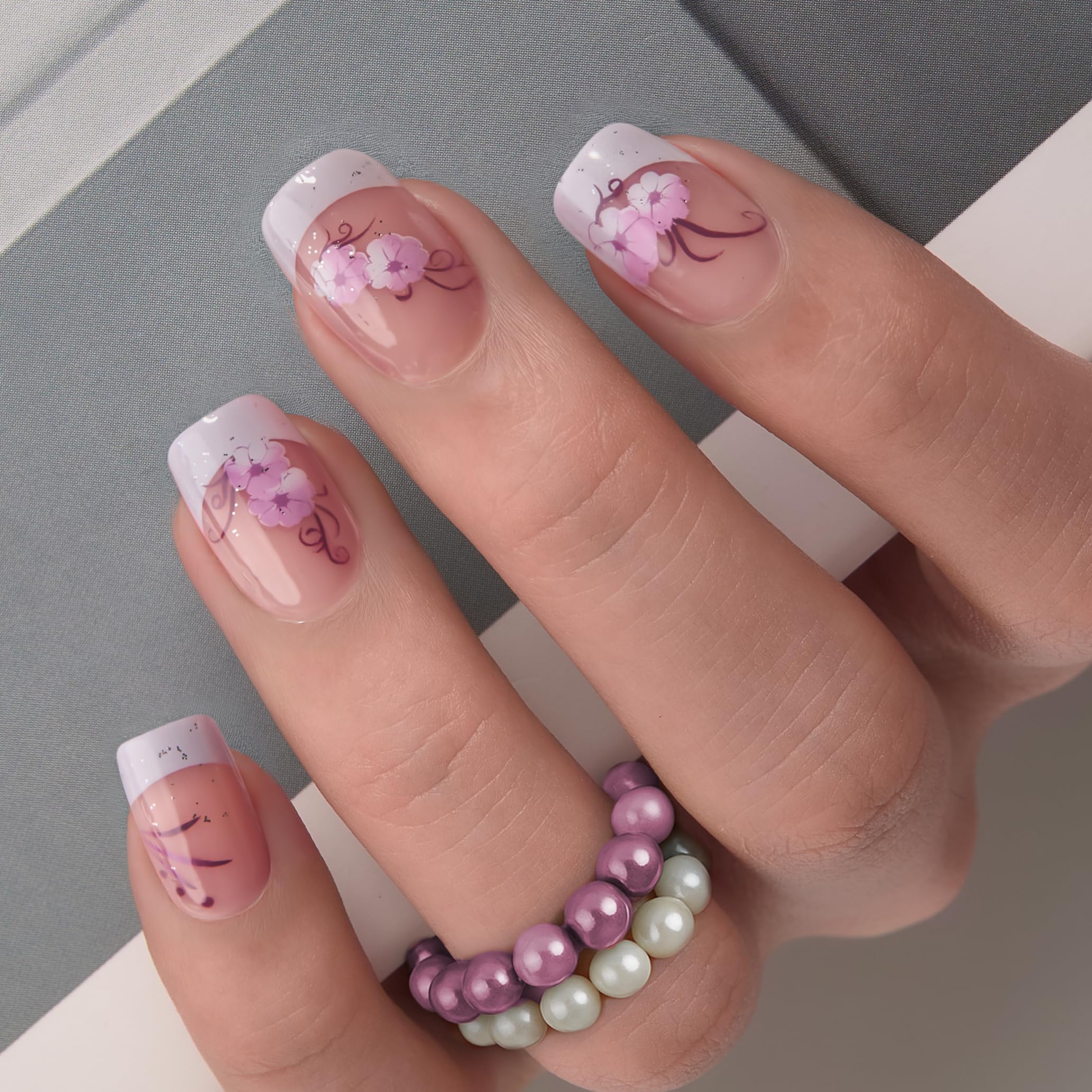 CurvLife front packaging showing apricot glossy press-on nails and purple flowers, ready-to-wear benefit