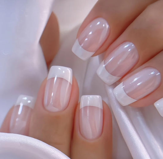CurvLife short square apricot nails on hand showing glossy natural finish and comfort