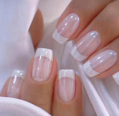 CurvLife short square apricot nails on hand showing glossy natural finish and comfort