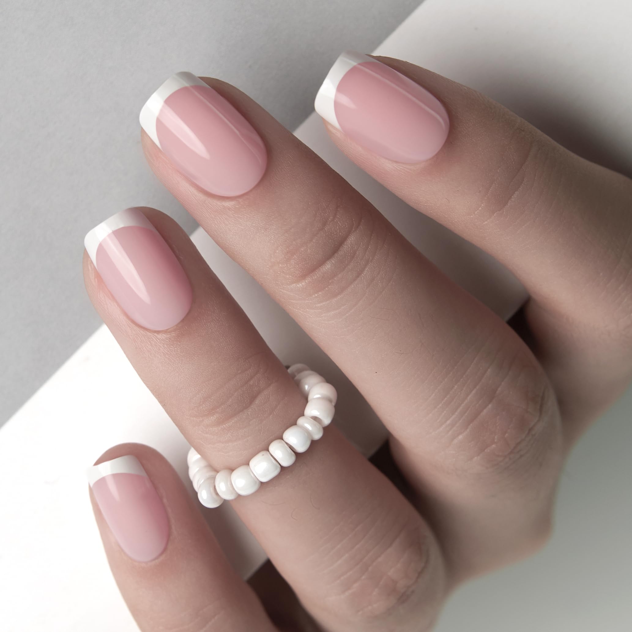 Curvlife close-up of handmade gel French tip detail showing salon-quality finish benefit