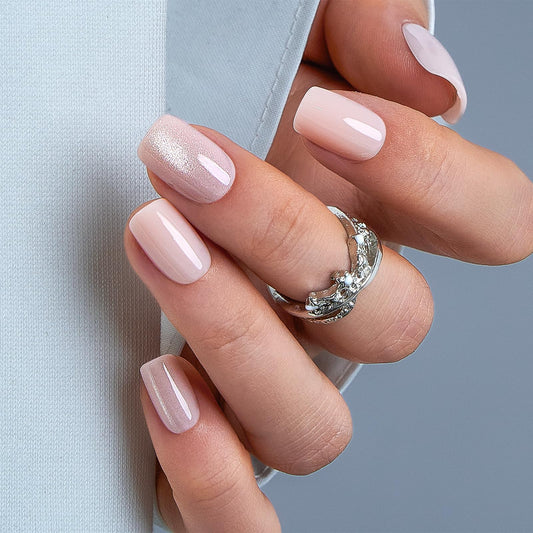 CurvLife close-up of gel topcoat revealing glossy apricot finish and durable shine benefit