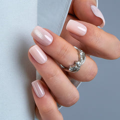 CurvLife close-up of gel topcoat revealing glossy apricot finish and durable shine benefit