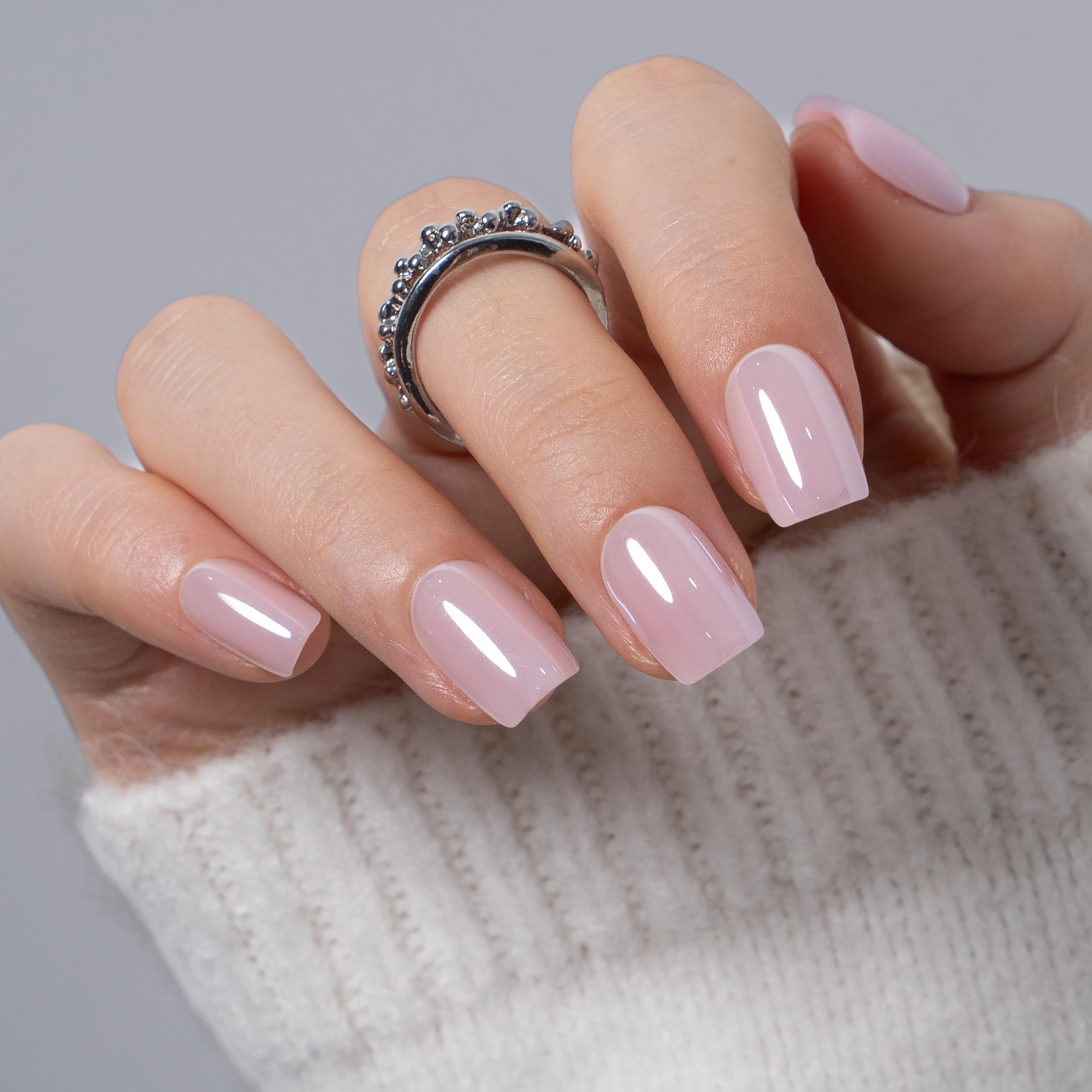 CurvLife close-up of glossy gel finish and French-tip detail, durable salon shine