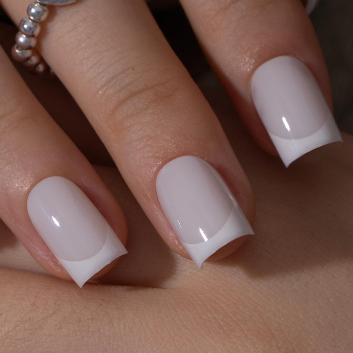 CurvLife front packaging with apricot short square nails and clear benefits
