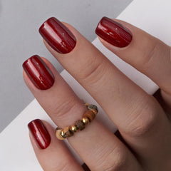 CurvLife front packaging showing burgundy press-on nails and storage box, easy styling benefit