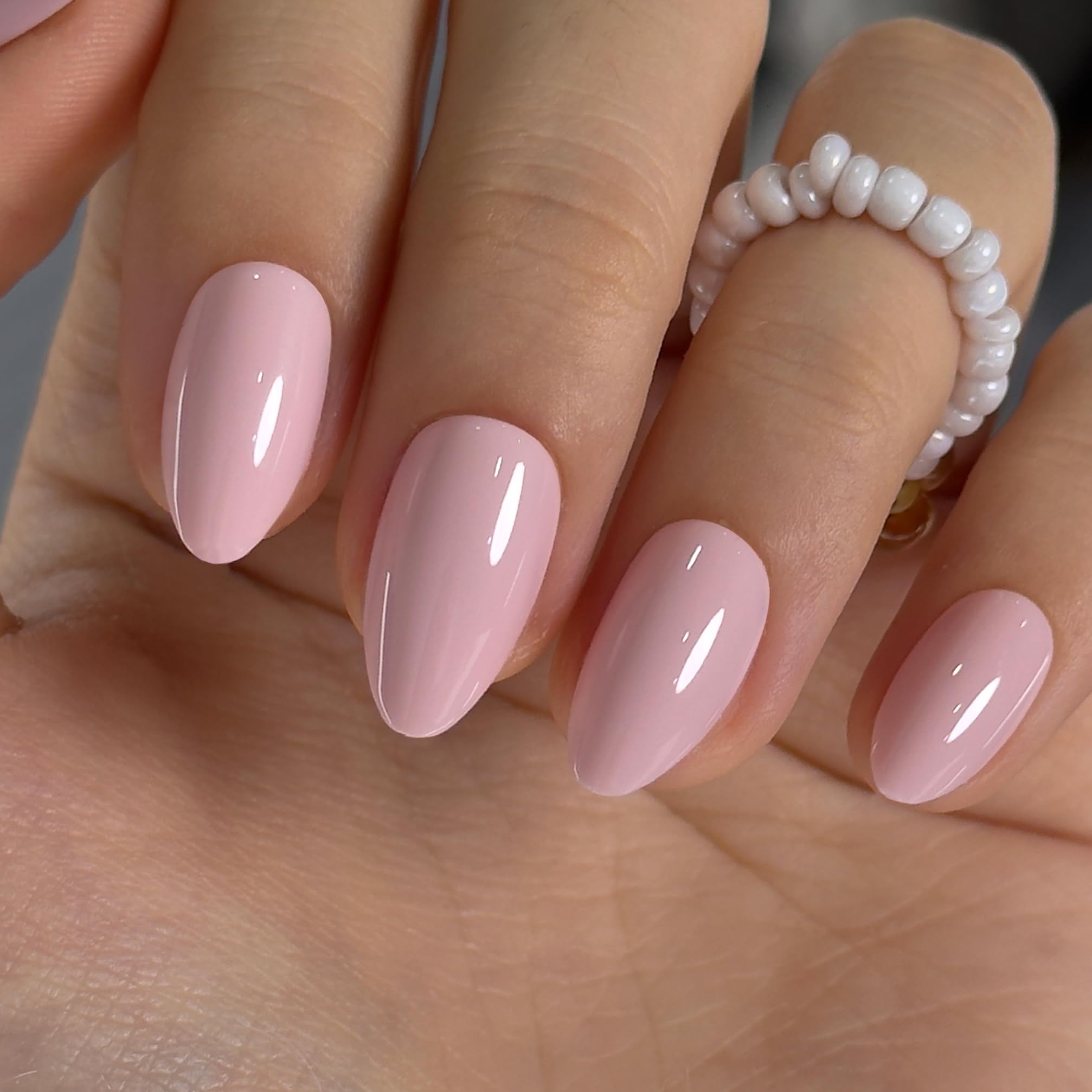 Curvlife front packaging showing medium almond pink press-on nails and kit contents for convenience