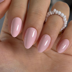 Curvlife front packaging showing medium almond pink press-on nails and kit contents for convenience