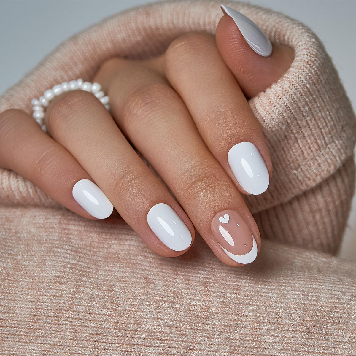 CurvLife front packaging showing milky white and nude heart press on nails, quick salon look