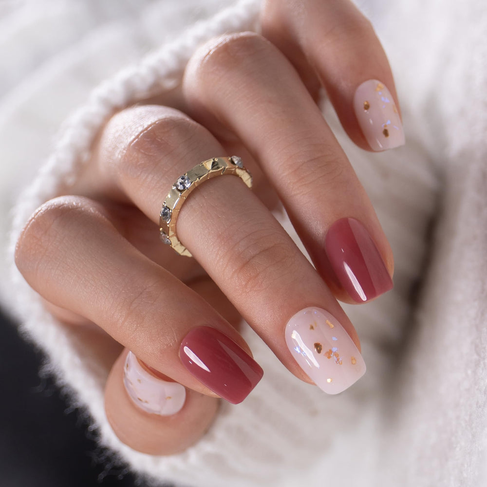 CurvLife side view of almond-shaped Honey Drift nail showing natural curvature and fit