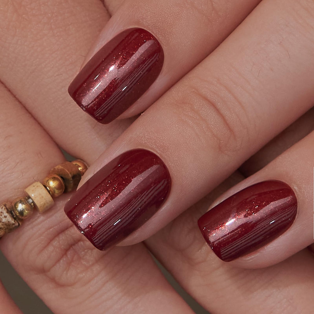 CurvLife hands applying a press-on nail demonstrating quick application and comfortable fit