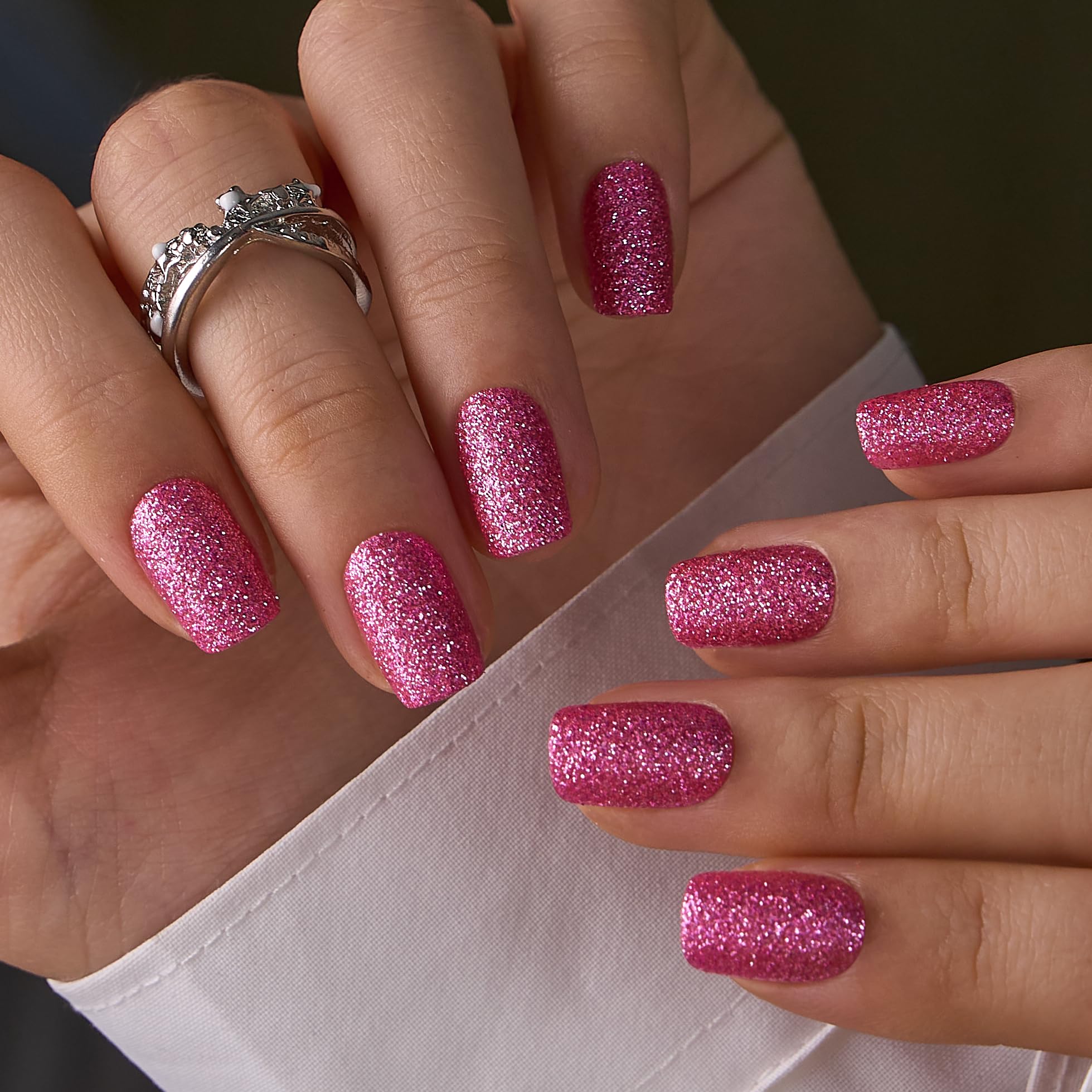 CurvLife nails in hand during application illustrating fast at-home manicure