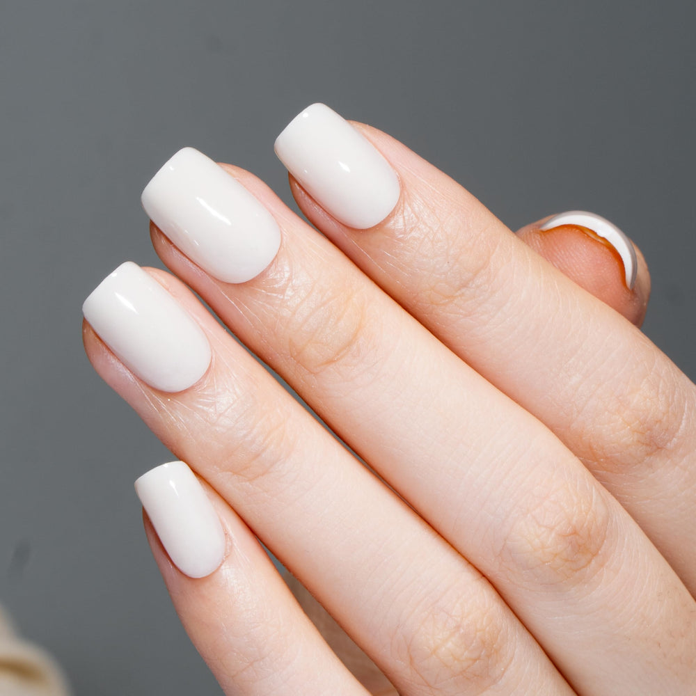 CurvLife press-on nails being applied by hand for fast salon-style results