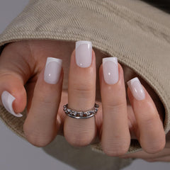 CurvLife nails applied on hand demonstrating natural short square fit