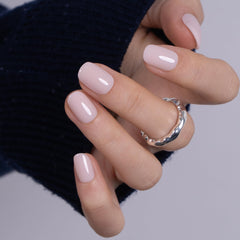 CurvLife nails on hand in lifestyle scene offering a polished outfit complement