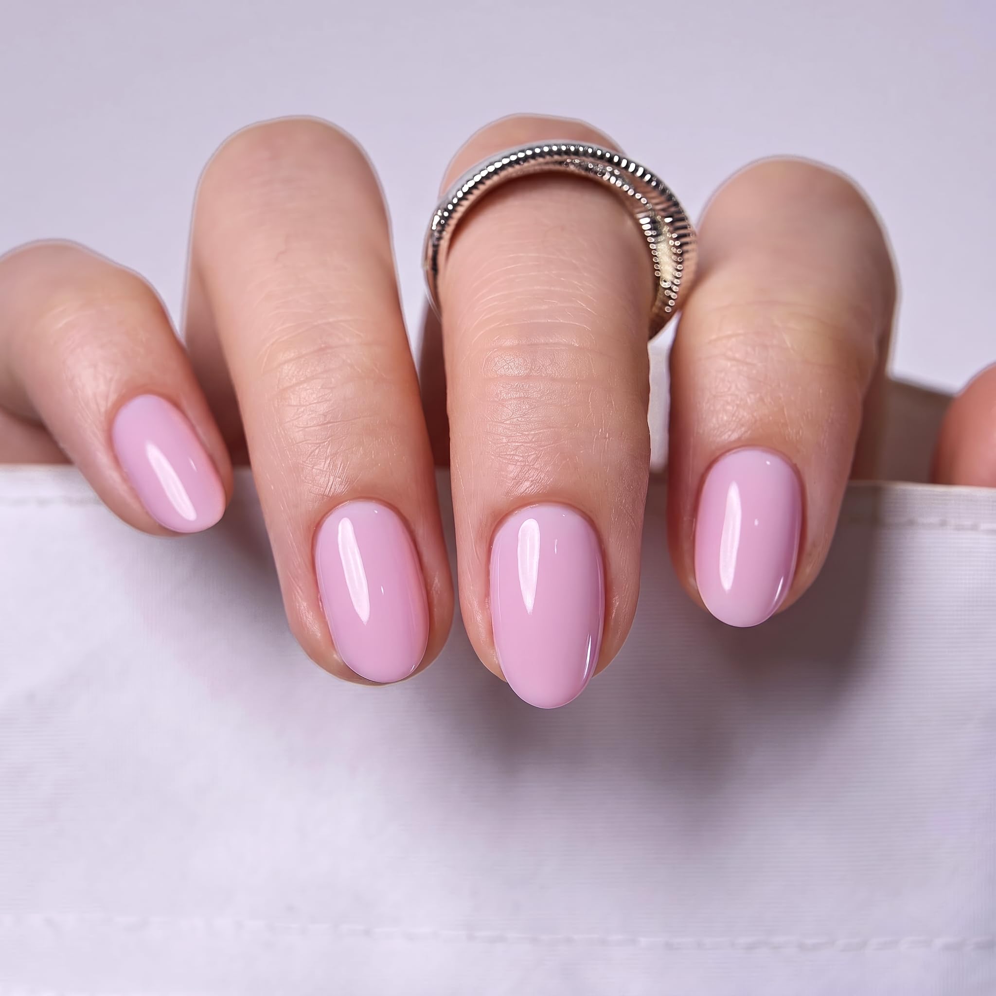 CurvLife nails being applied by hand demonstrating easy at-home salon-quality results