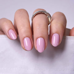 CurvLife nails being applied by hand demonstrating easy at-home salon-quality results