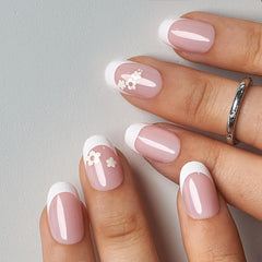 CurvLife Pure Bloom nails held in hand for scale and easy size selection benefit