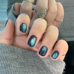 Curvlife worn on hands lifestyle shot showing natural-looking short nails