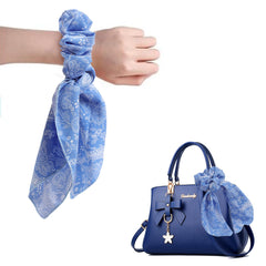 Cutewing paisley scarf detail showing stitched edge and pattern versatility