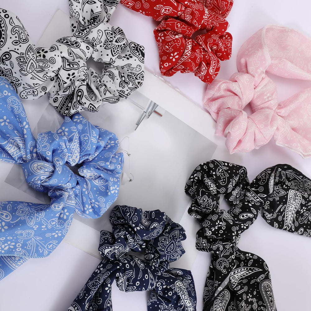 Cutewing scrunchie worn in ponytail demonstrating secure hold without damage