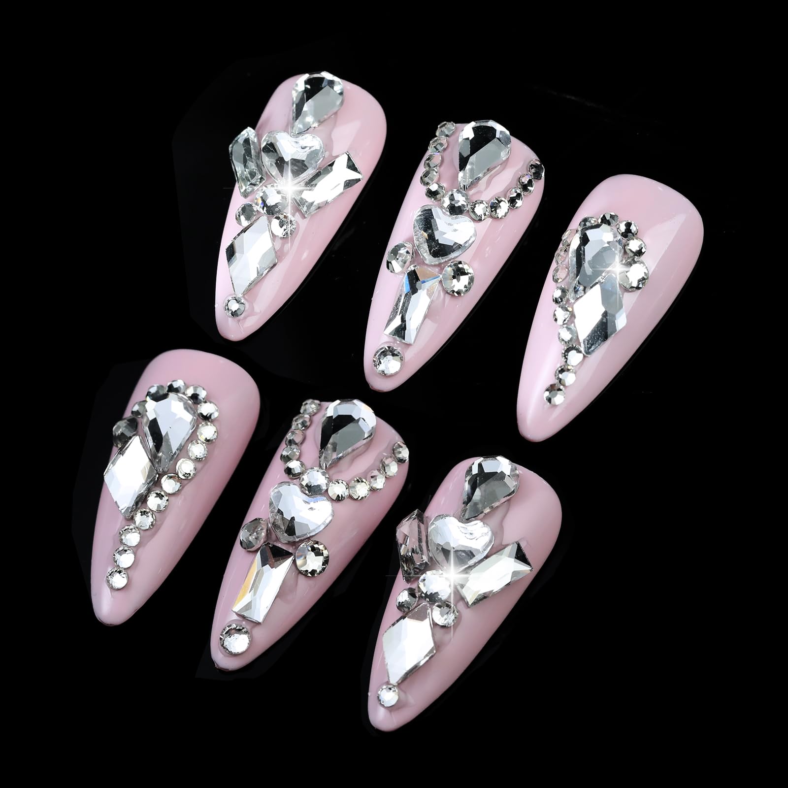 Cycullinyt tweezer and pickup pen placed beside crystals for precise placement