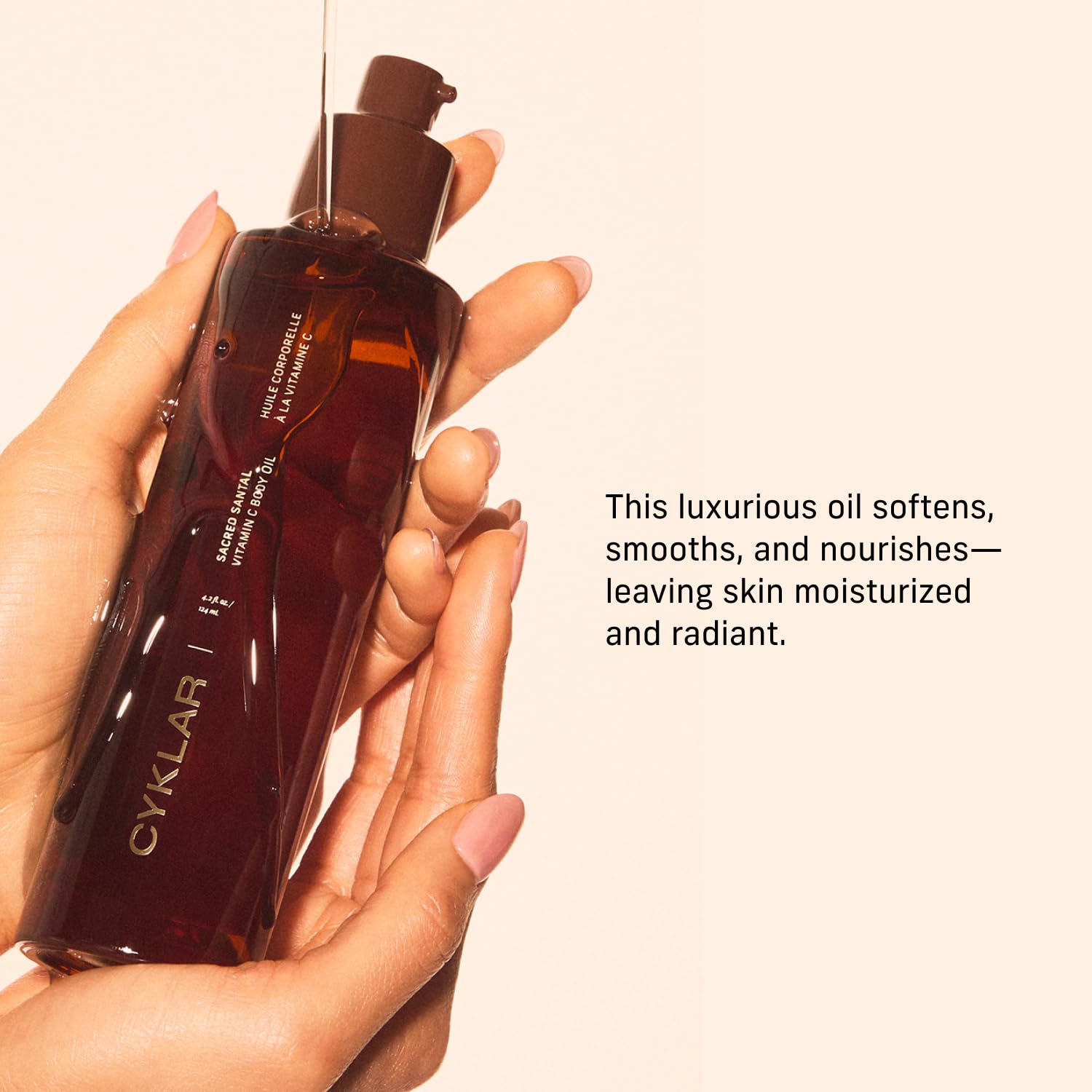CYKLAR bottle held in hand conveying size and easy everyday use benefit