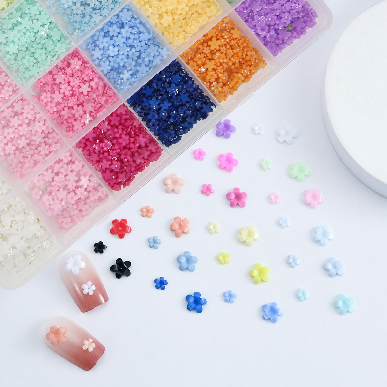 CYUXING nail artist applying flower charms in a manicured setting for professional results