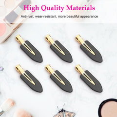 D clips held in hand scale demonstrating compact 2.45-inch size for travel convenience
